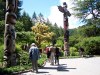 Totem poles in Butchart Gardens by Harry Shetrone