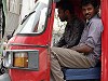 Men in an autorickshaw by Elton Smith