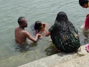 Bathing in the Cauvery river at Nimishamba temple image