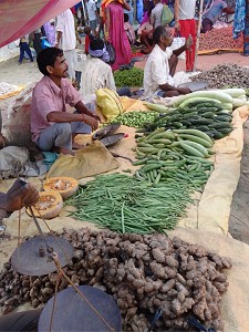 Man selling vegetables image